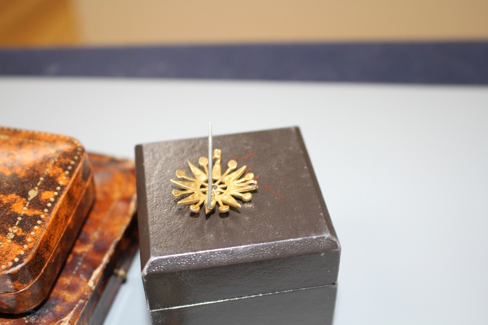 A 9ct gold brooch, a plated pocket watch, other jewellery and jewellery boxes